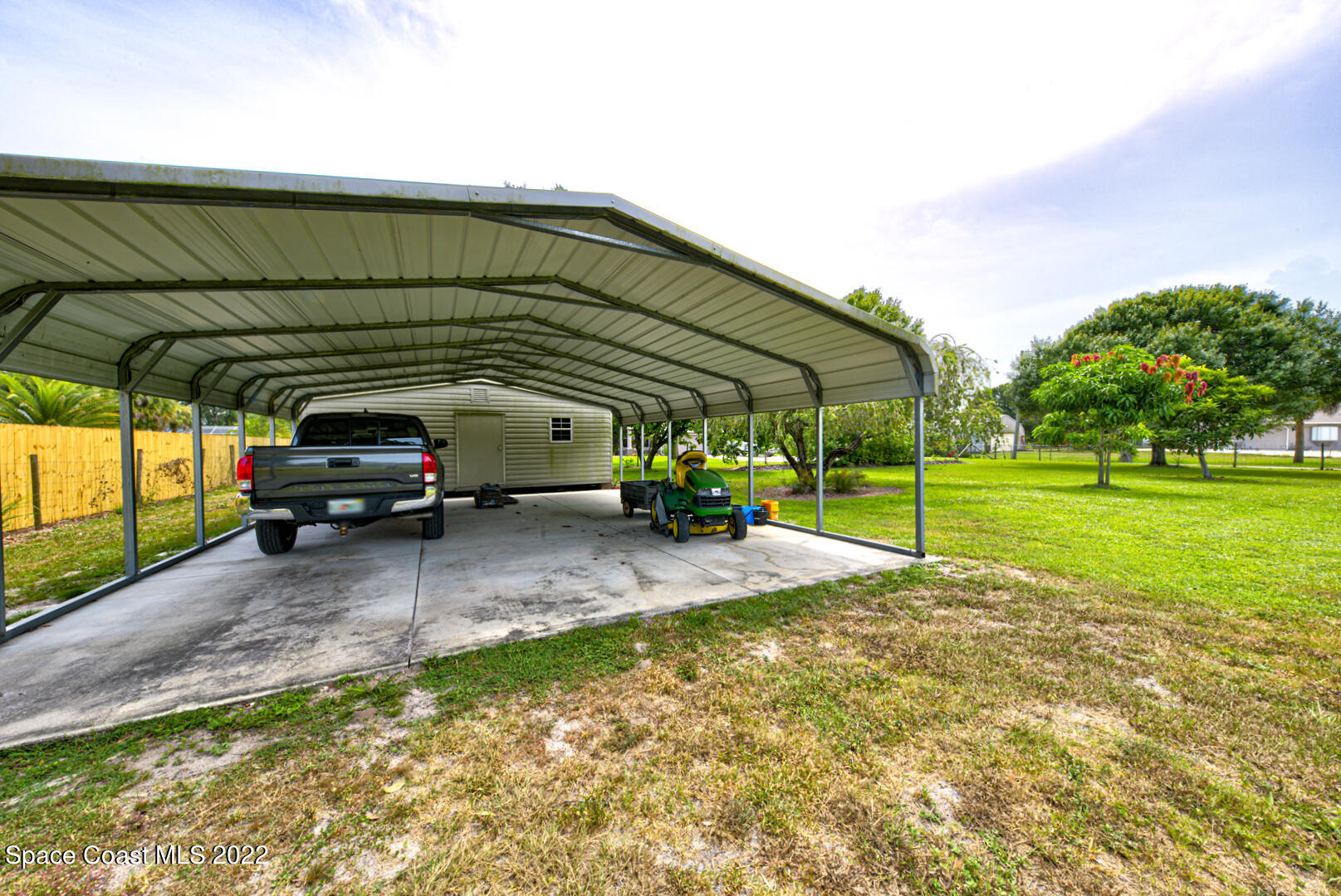 3945 Post Road Melbourne, FL 32934 - Photo 16 of 24 a view of parked cars in front of house
