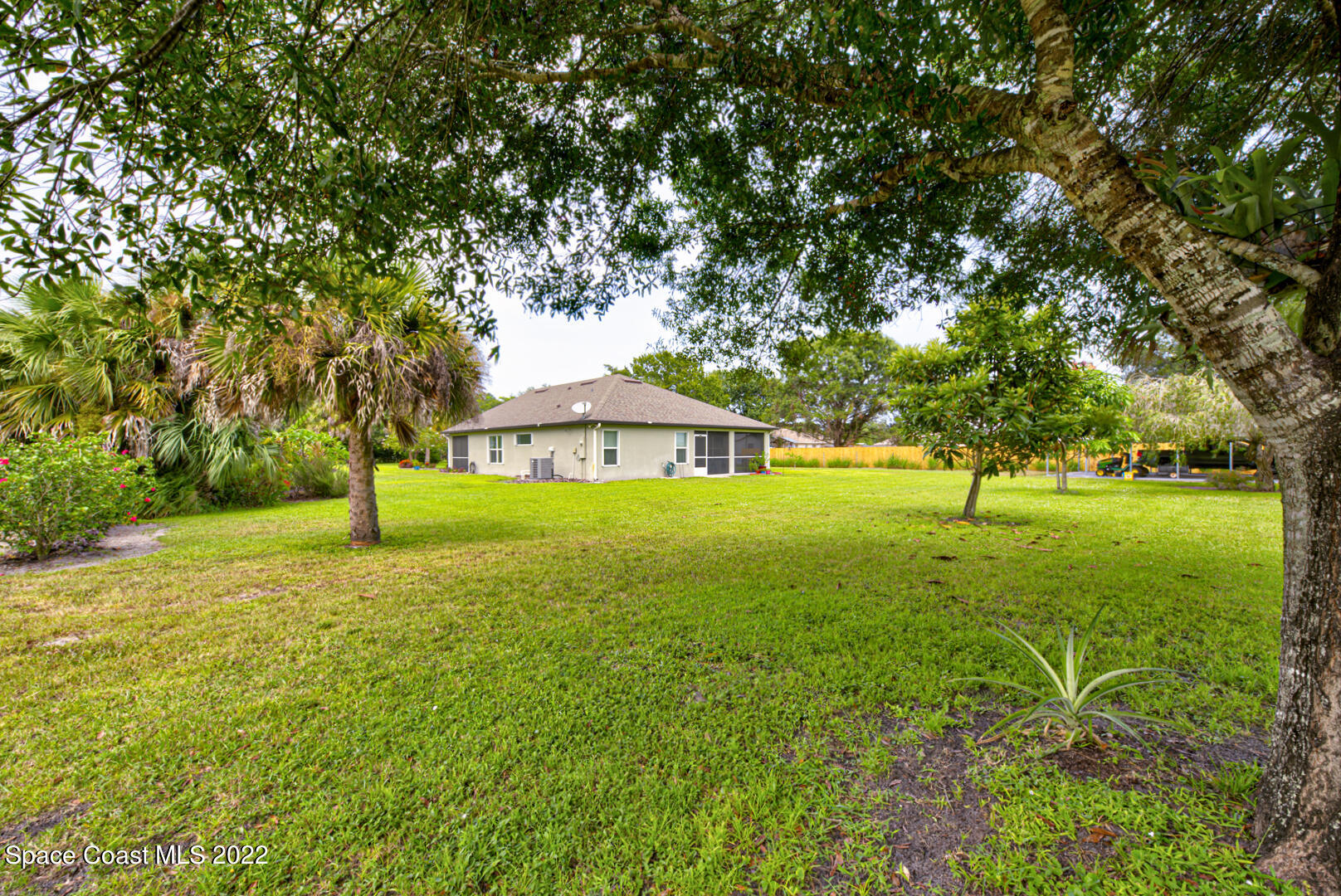 3945 Post Road Melbourne, FL 32934 - Photo 18 of 24 a view of a trees with a big yard