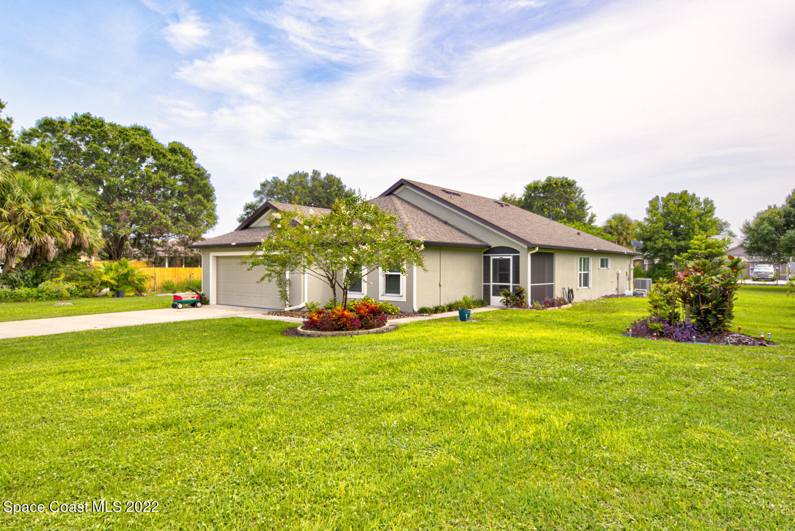 3945 Post Road Melbourne, FL 32934 - Photo 3 of 24 a view of a house with backyard and garden