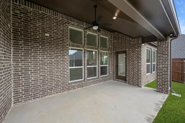 a view of an empty room with a garage