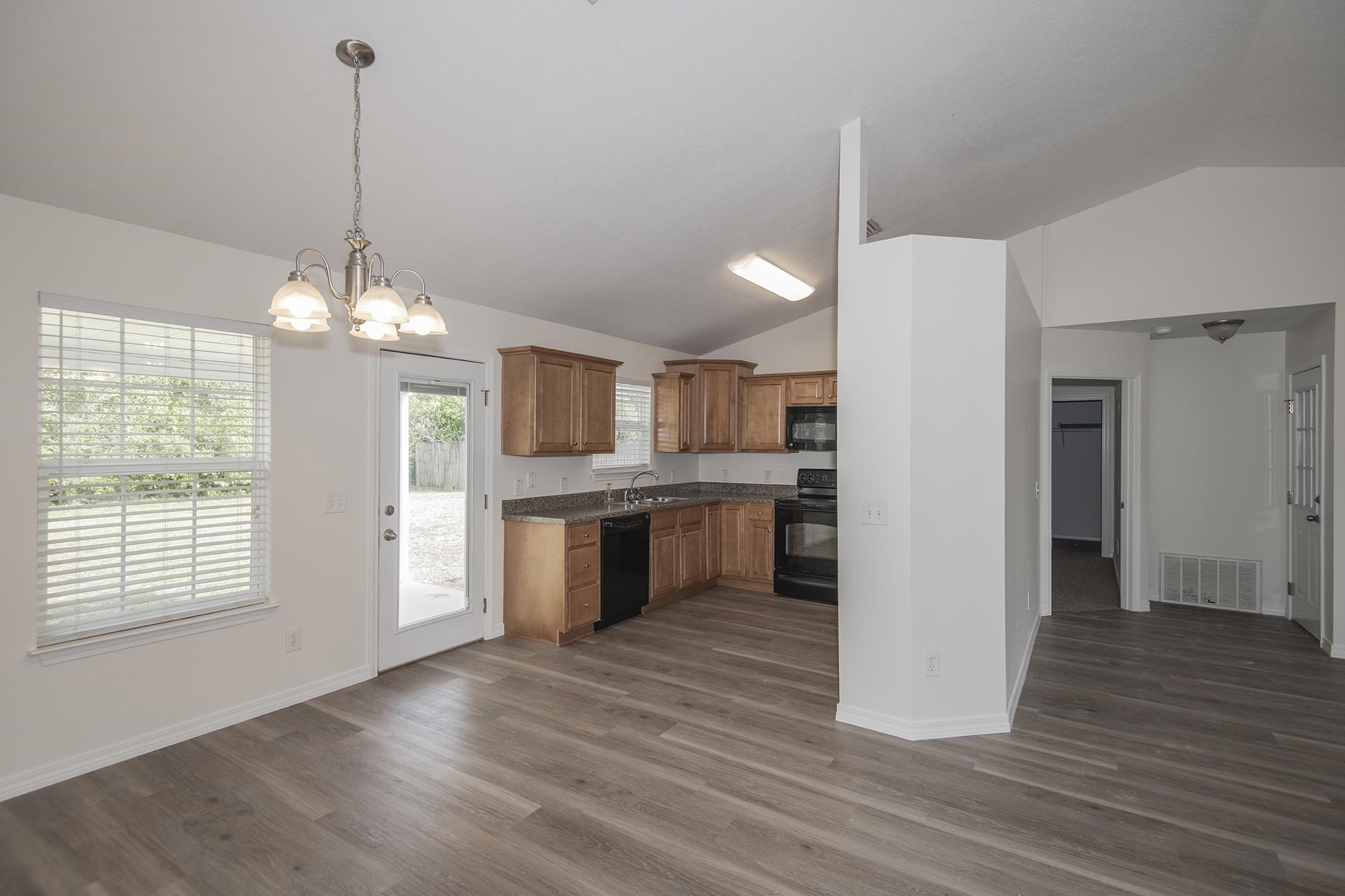 4608 Anna Simpson Road Milton, FL 32583 - Photo 12 of 22 a view of a kitchen and kitchen with a chandelier