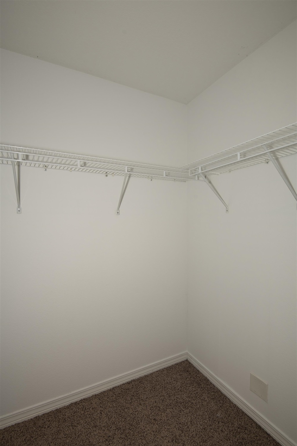 4608 Anna Simpson Road Milton, FL 32583 - Photo 20 of 22 a view of a room with racks on the wall
