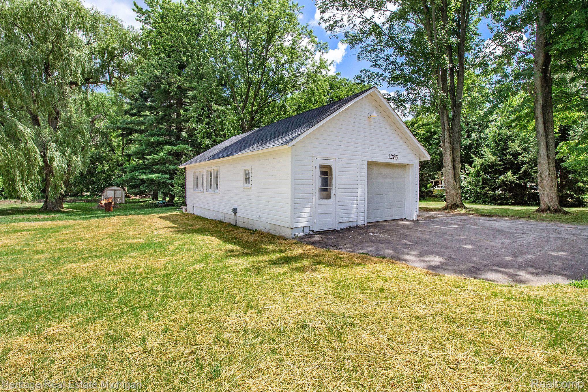1285 Byron Road Howell, MI 48843 - Photo 19 of 22 The garage is here for your all your needs!