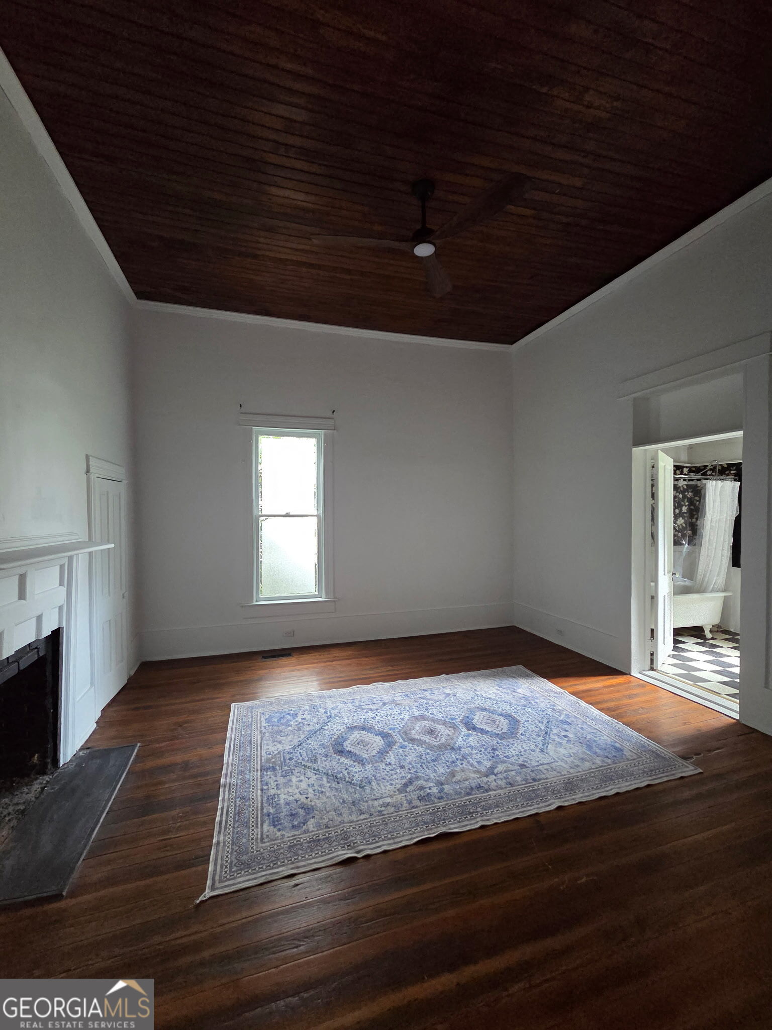 1907 Broad Street Statham, GA 30666 - Photo 11 of 20 a bedroom with a bed and a window