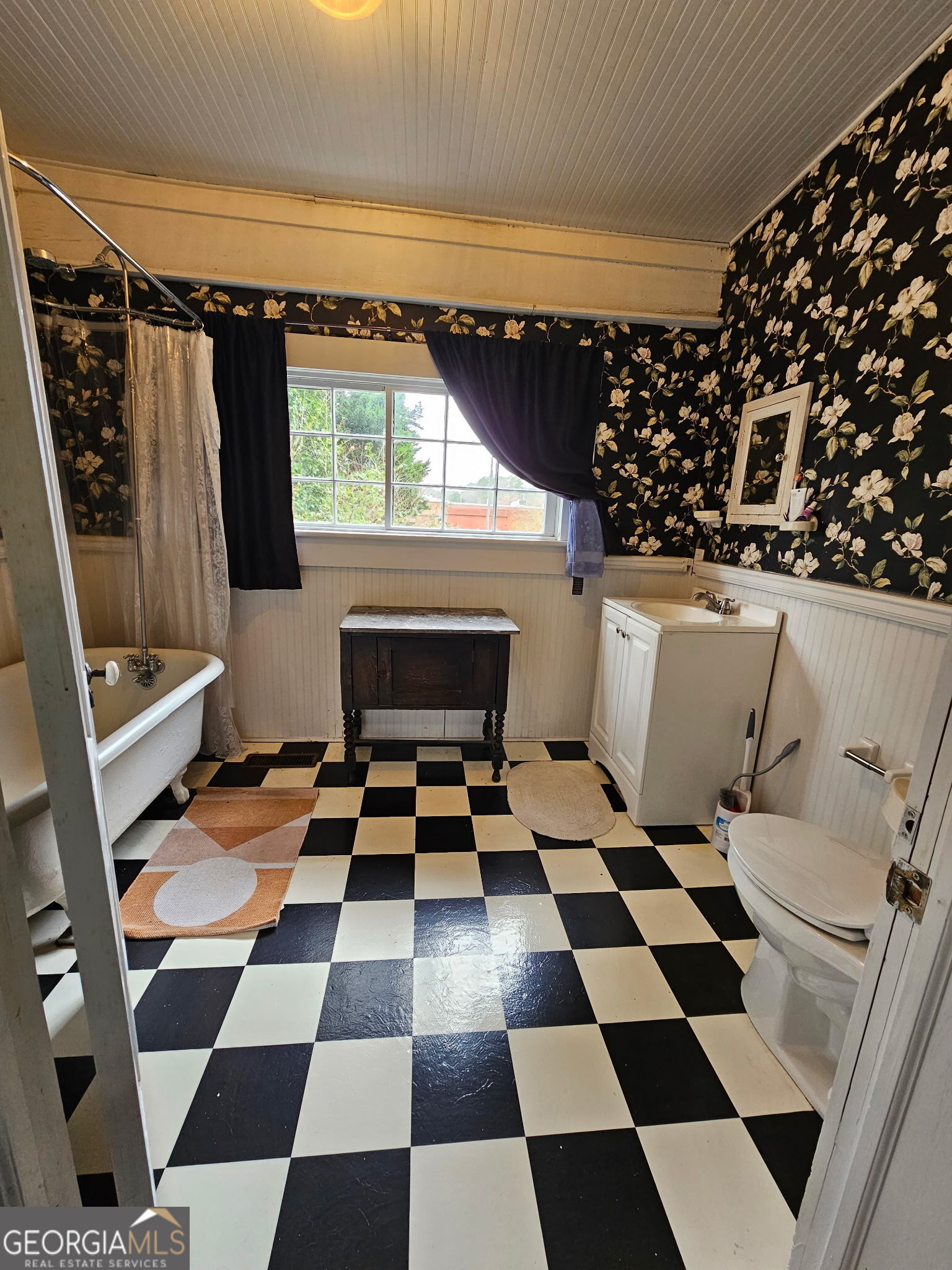 1907 Broad Street Statham, GA 30666 - Photo 13 of 20 a room with a black white checkered floor and a black white checkered floor