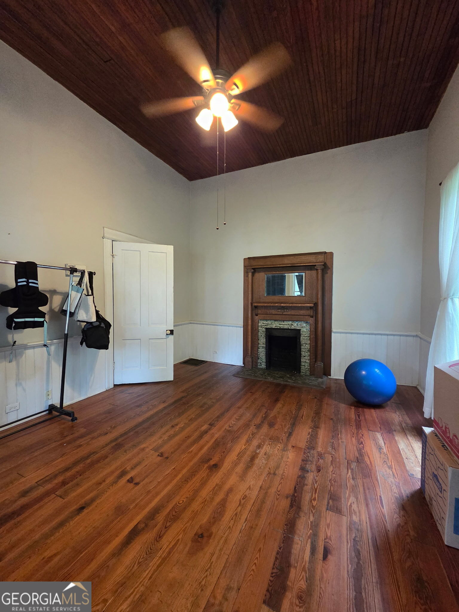 1907 Broad Street Statham, GA 30666 - Photo 14 of 20 a view of empty room with wooden floor