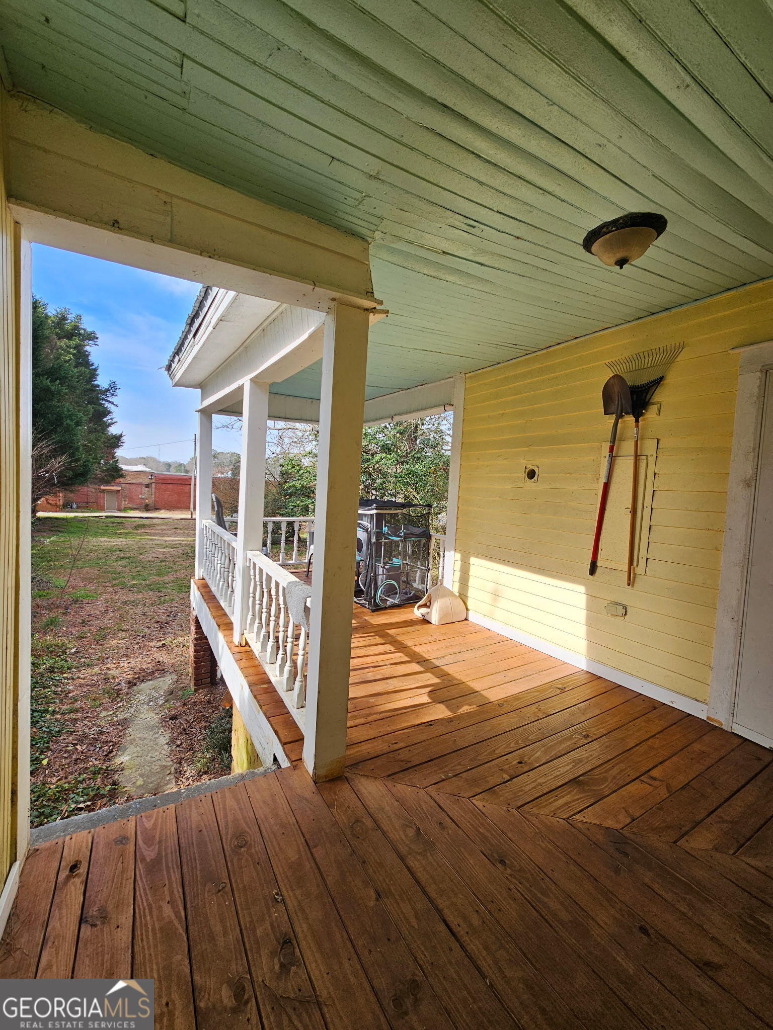 1907 Broad Street Statham, GA 30666 - Photo 18 of 20 a view of a porch