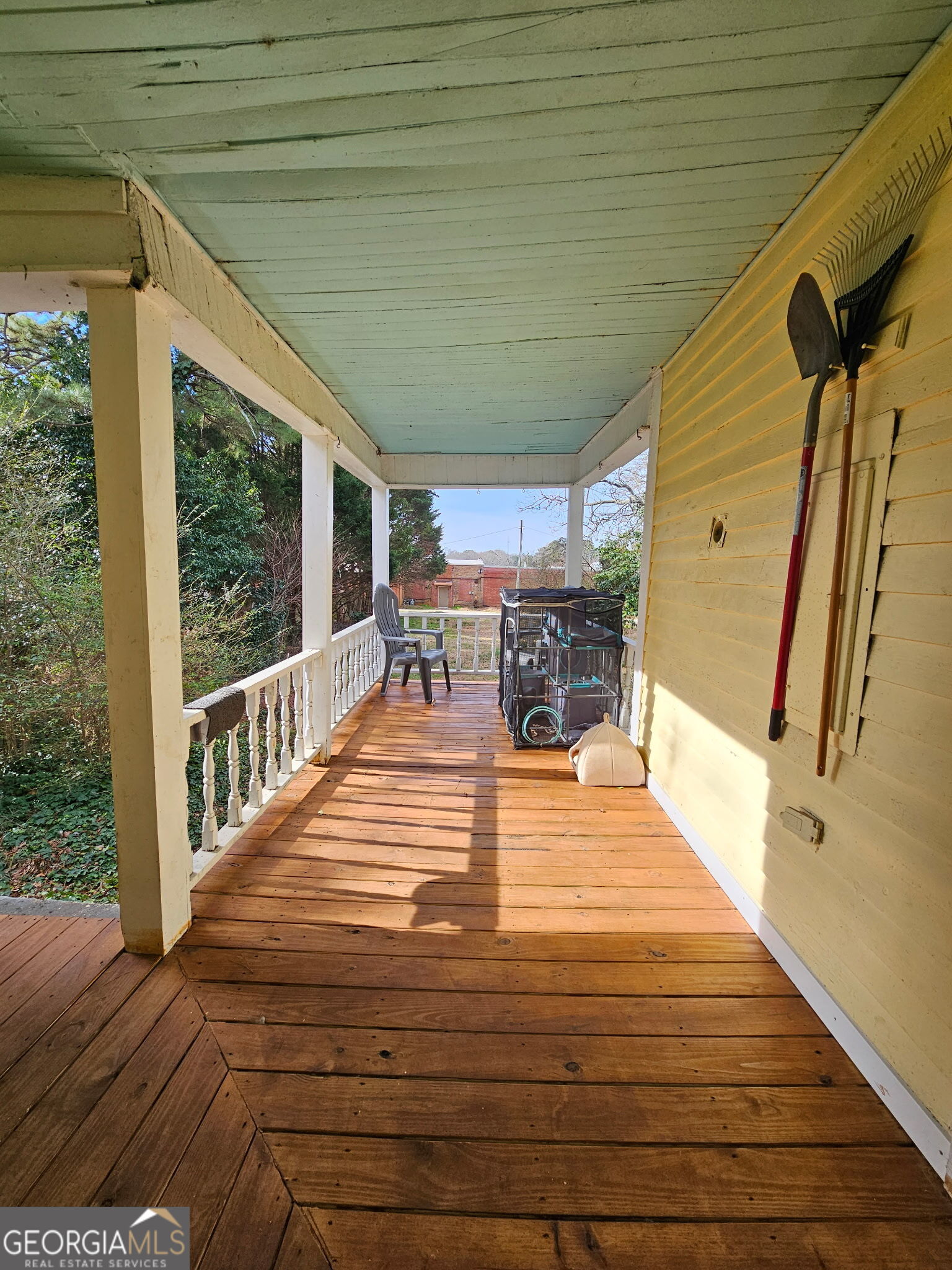 1907 Broad Street Statham, GA 30666 - Photo 19 of 20 a view of a patio with wooden floor
