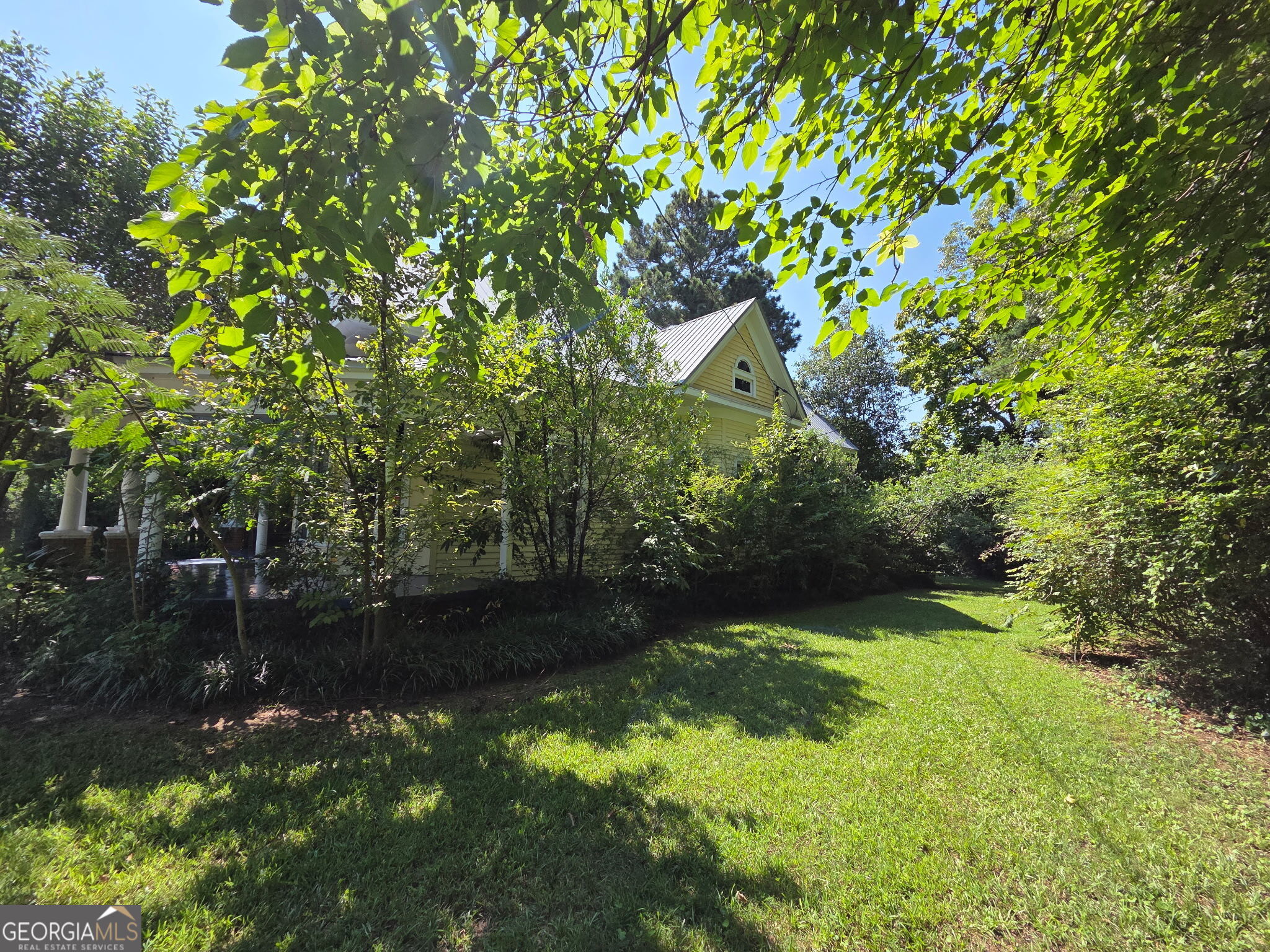 1907 Broad Street Statham, GA 30666 - Photo 20 of 20 a view of a tree in a yard