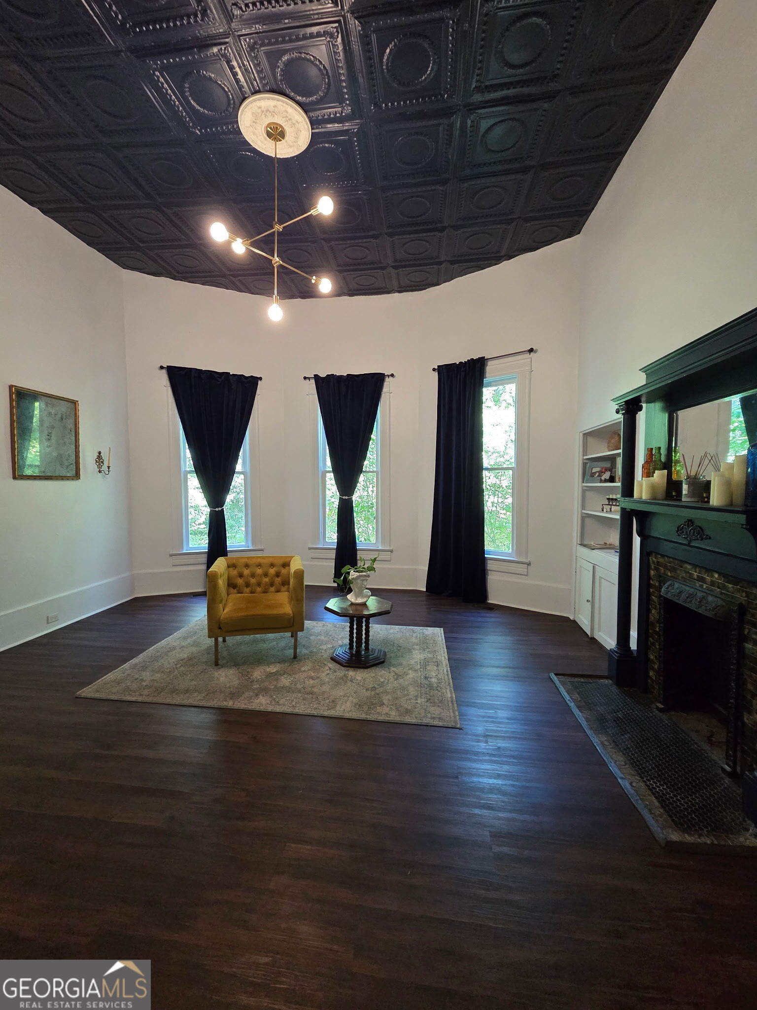 1907 Broad Street Statham, GA 30666 - Photo 8 of 20 a view of kitchen with furniture and a chandelier