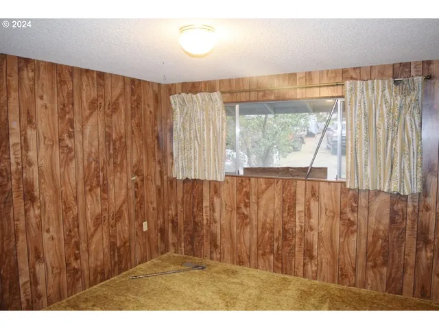 a view of outdoor space with wooden floor