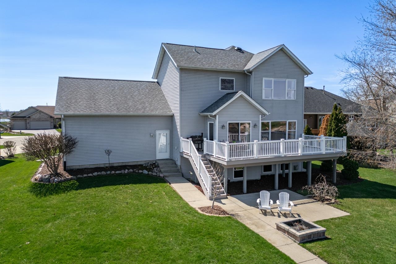 12805 Edgewater Pointe Winnebago, IL 61088 - Photo 35 of 47 a aerial view of a house with a yard porch and sitting area