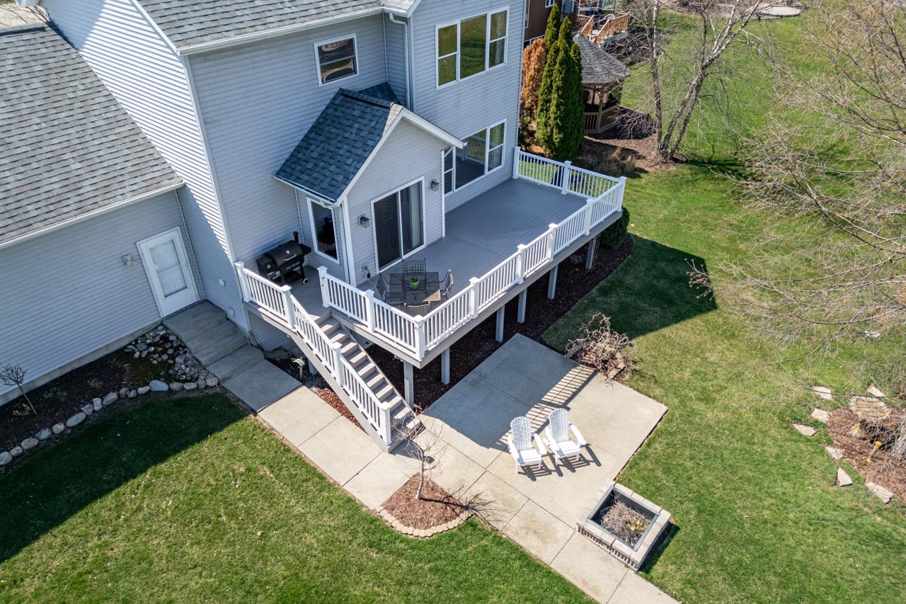 12805 Edgewater Pointe Winnebago, IL 61088 - Photo 36 of 47 an aerial view of a house having swimming pool