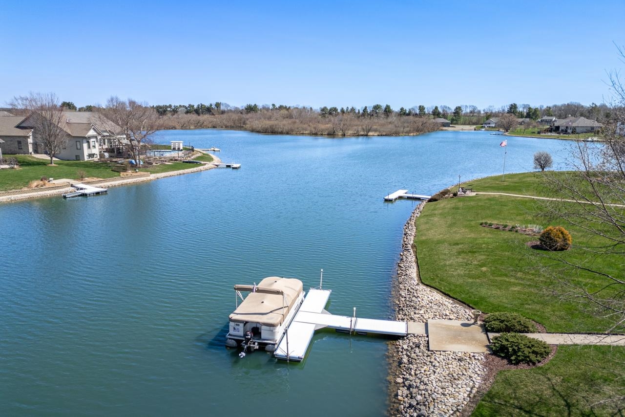 12805 Edgewater Pointe Winnebago, IL 61088 - Photo 40 of 47 an aerial view of a house with a lake view