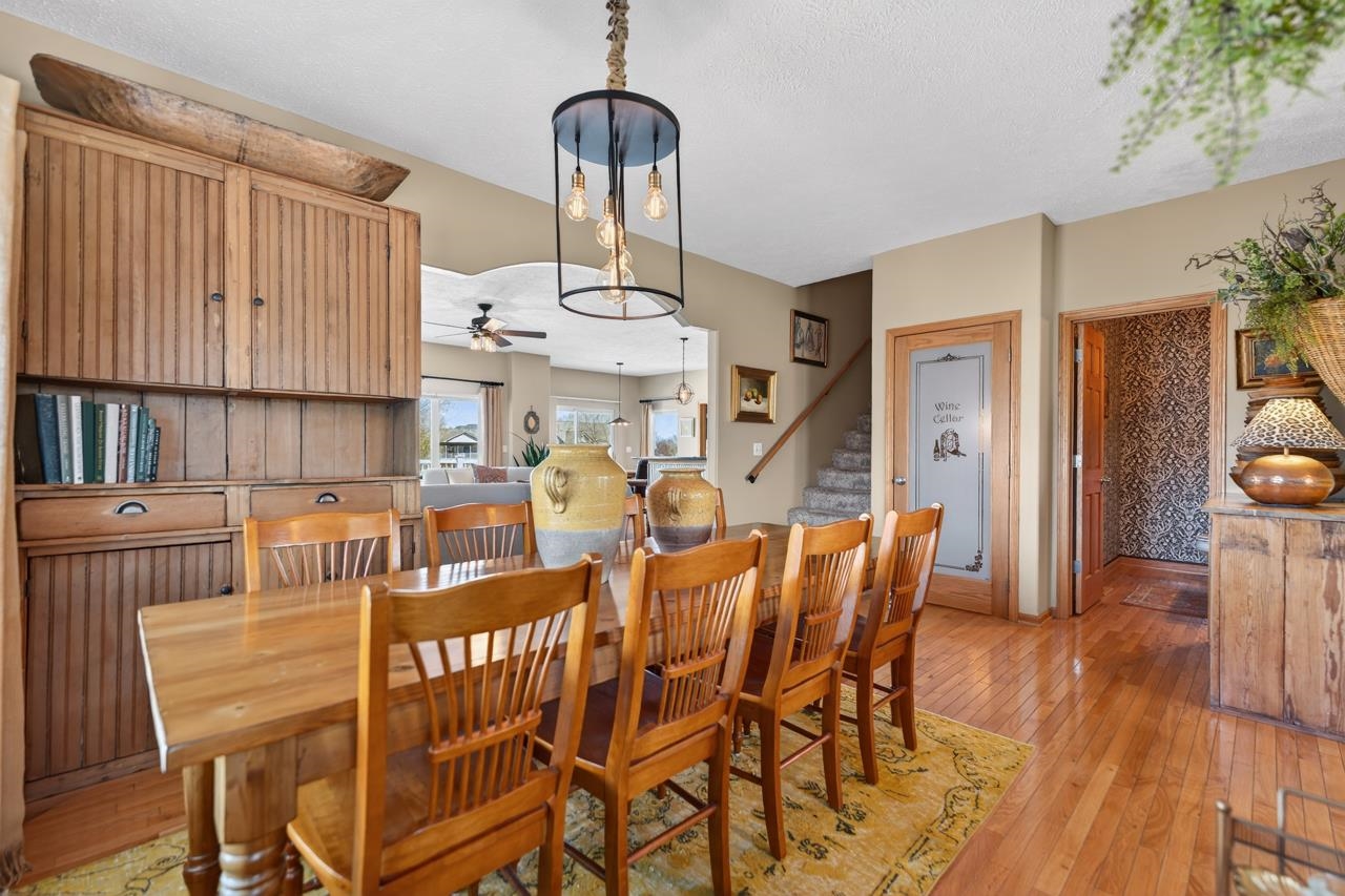12805 Edgewater Pointe Winnebago, IL 61088 - Photo 9 of 47 a view of a dining room with furniture and wooden floor