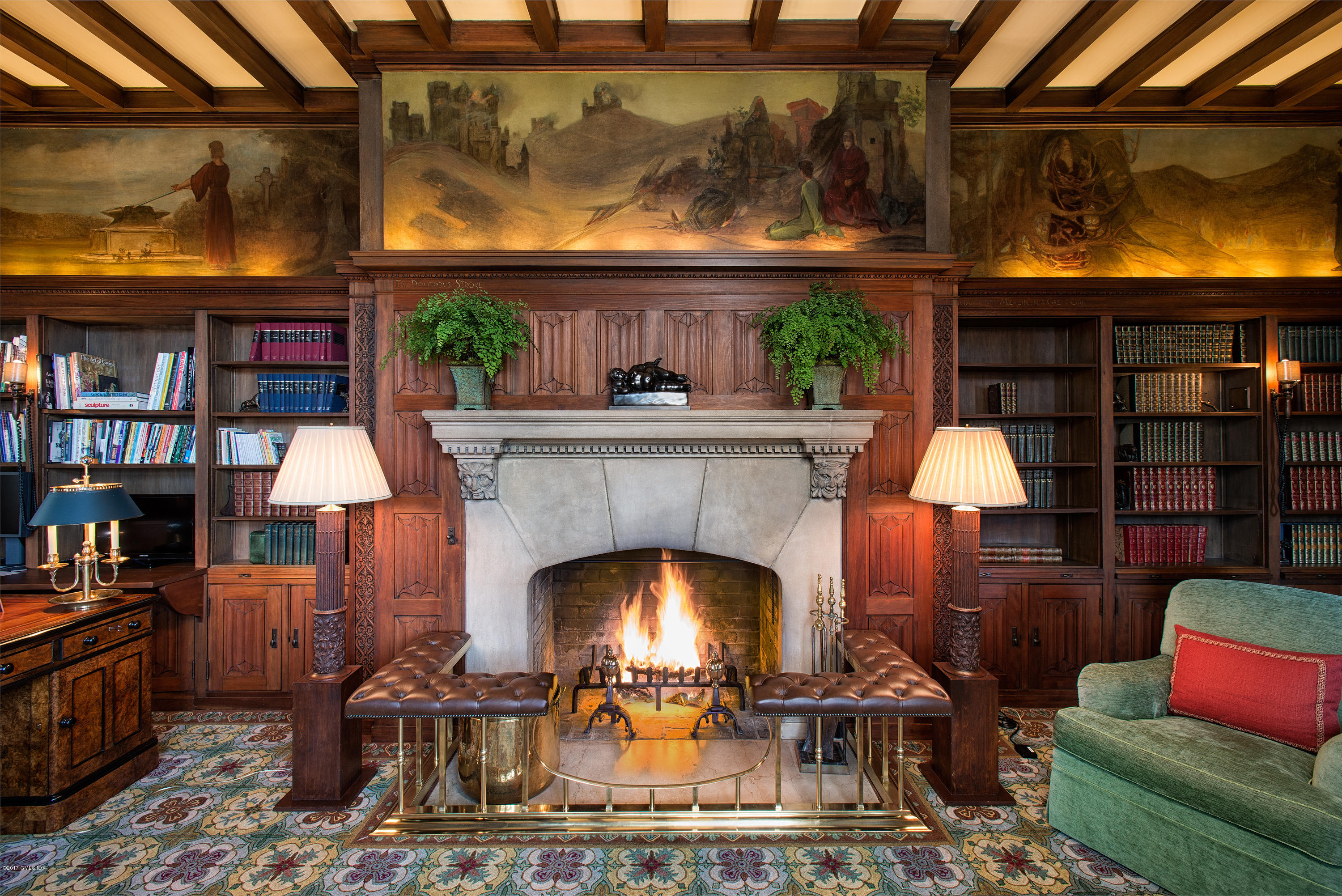9 Sabine Farm Road Greenwich, CT 06831 - Photo 11 of 26 a living room with furniture a fireplace and a flat screen tv