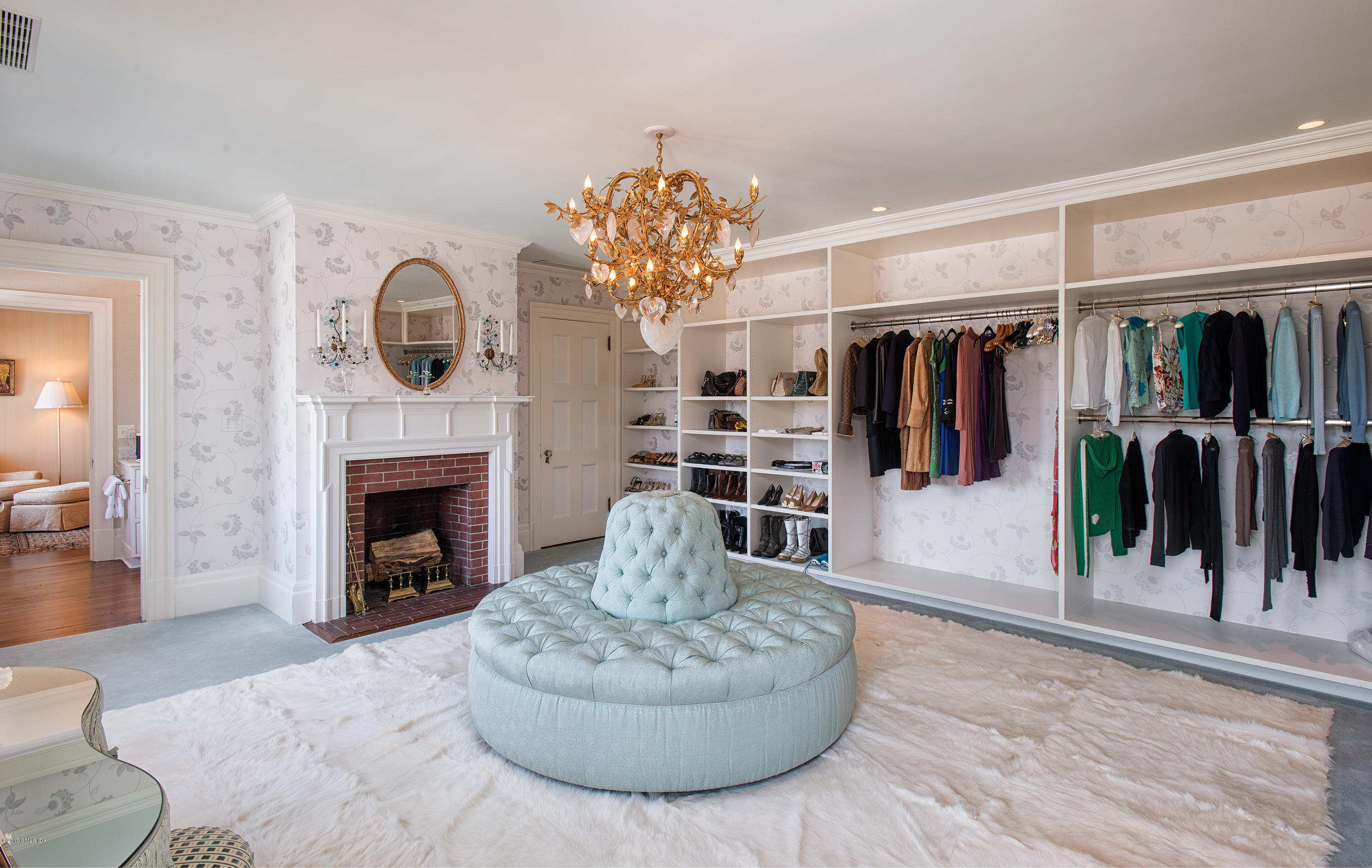 9 Sabine Farm Road Greenwich, CT 06831 - Photo 16 of 26 a living room with furniture and a fireplace