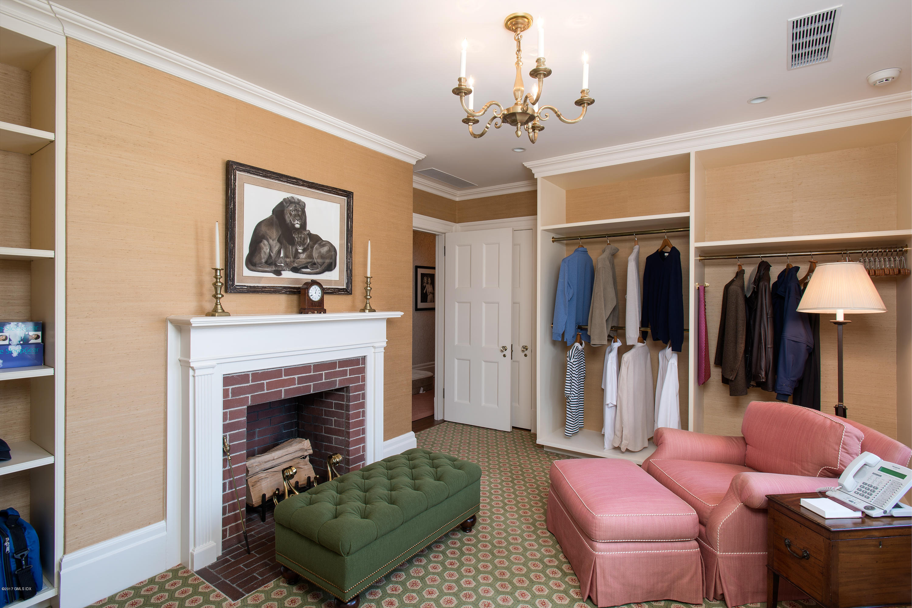 9 Sabine Farm Road Greenwich, CT 06831 - Photo 17 of 26 a living room with furniture and a fireplace