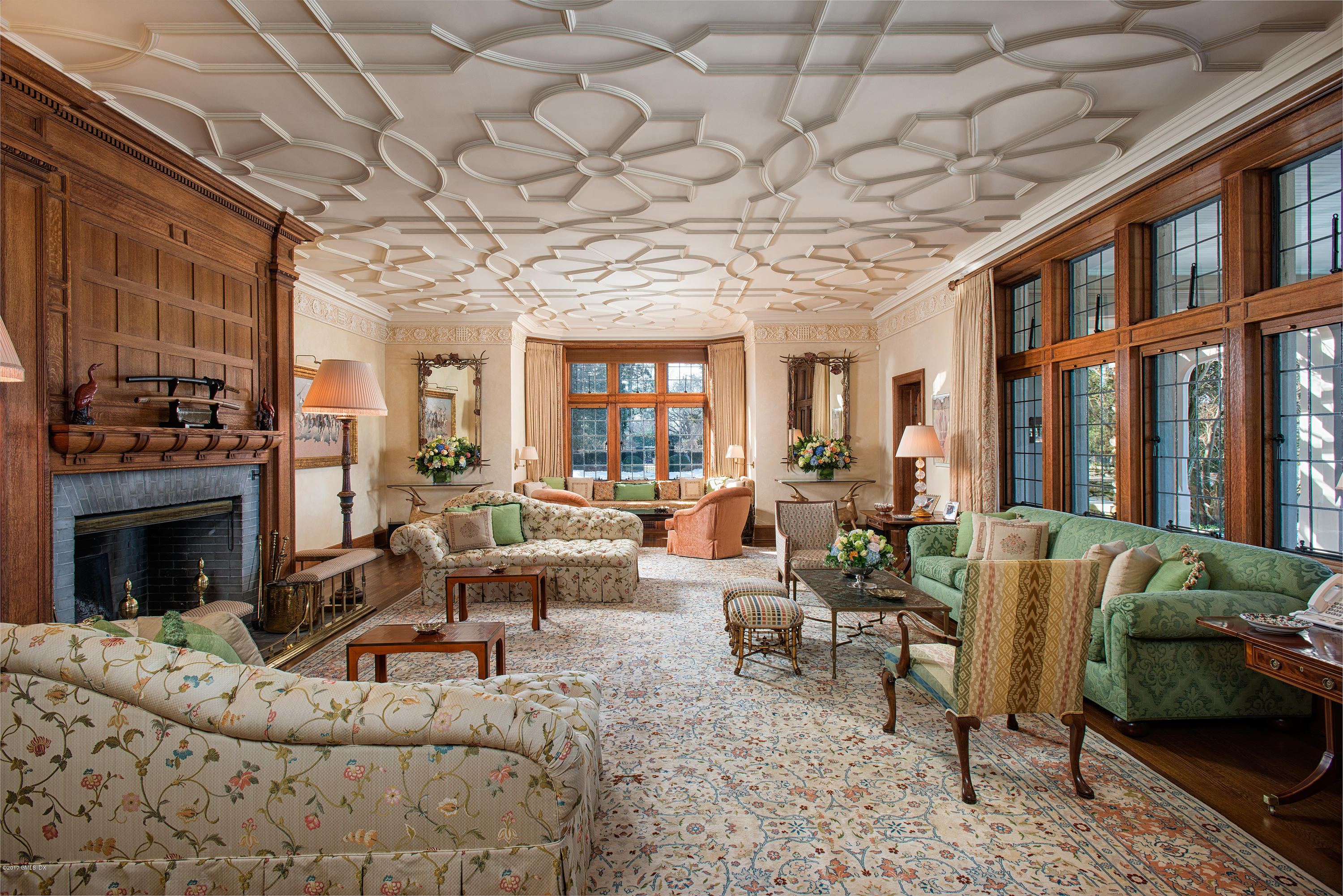 9 Sabine Farm Road Greenwich, CT 06831 - Photo 6 of 26 a living room with furniture and a fireplace