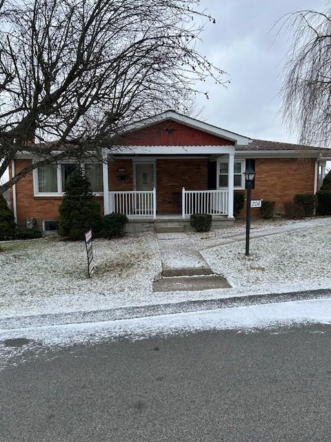a front view of a house with a porch