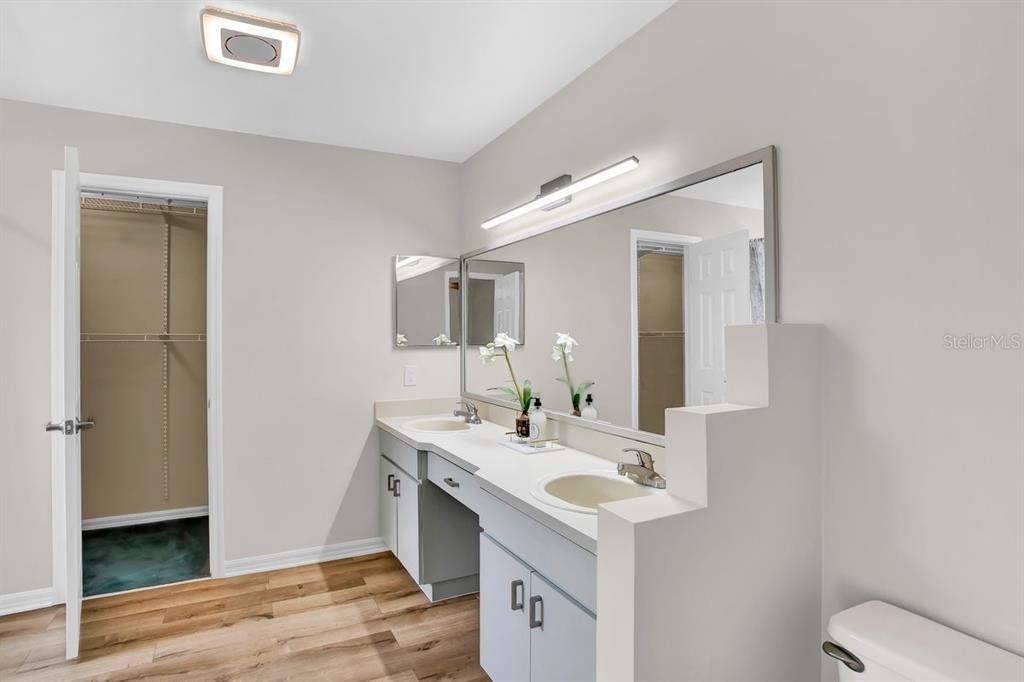 1706 Erin Brooke Drive Valrico, FL 33594 - Photo 15 of 39 a bathroom with a sink toilet and mirror