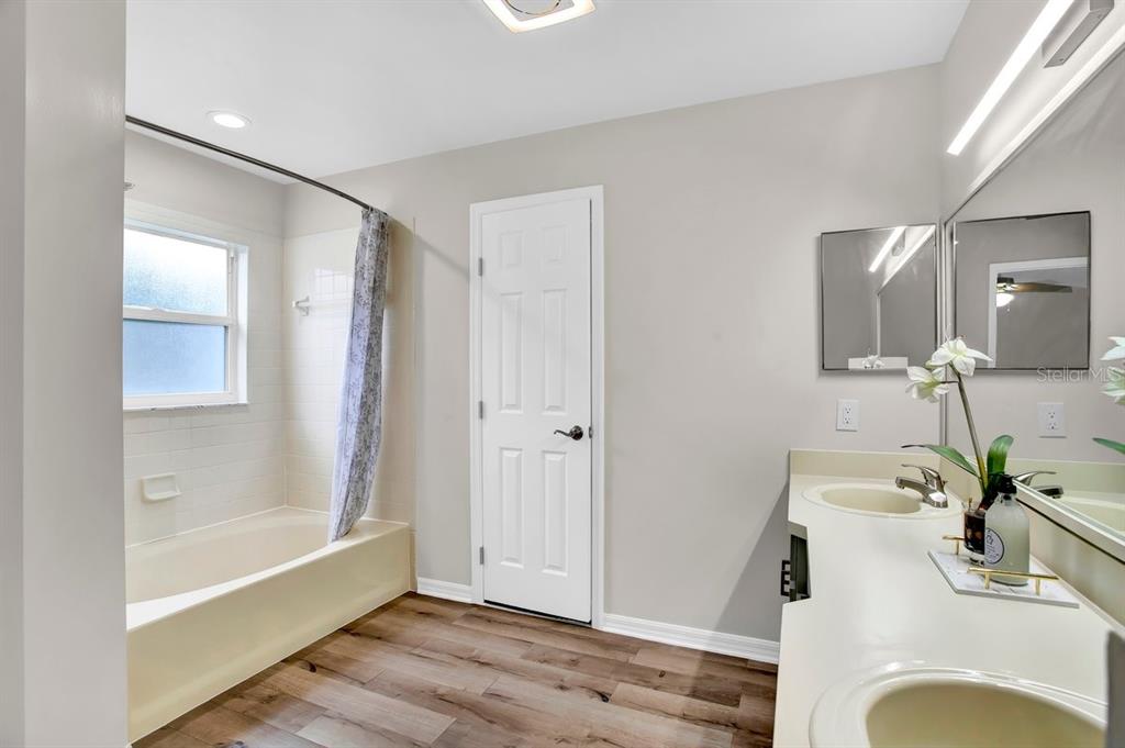 1706 Erin Brooke Drive Valrico, FL 33594 - Photo 16 of 39 a bathroom with a sink toilet and shower