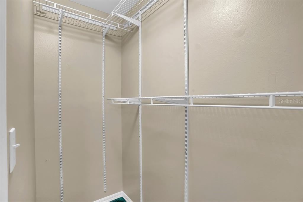 1706 Erin Brooke Drive Valrico, FL 33594 - Photo 18 of 39 a bathroom with a glass shower door