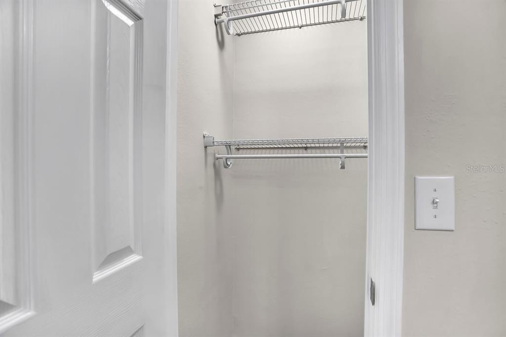 1706 Erin Brooke Drive Valrico, FL 33594 - Photo 20 of 39 a bathroom with a glass shower door