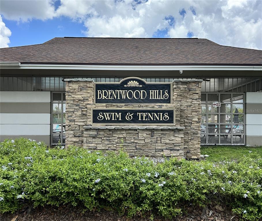 1706 Erin Brooke Drive Valrico, FL 33594 - Photo 34 of 39 a sign on the side of a building