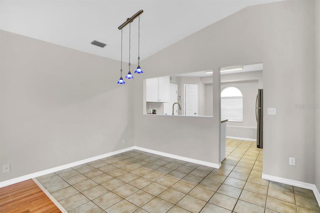 1706 Erin Brooke Drive Valrico, FL 33594 - Photo 7 of 39 a view of empty room with wooden floor