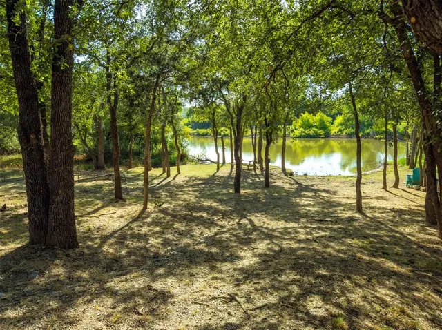 an aerial view of a house with a garden