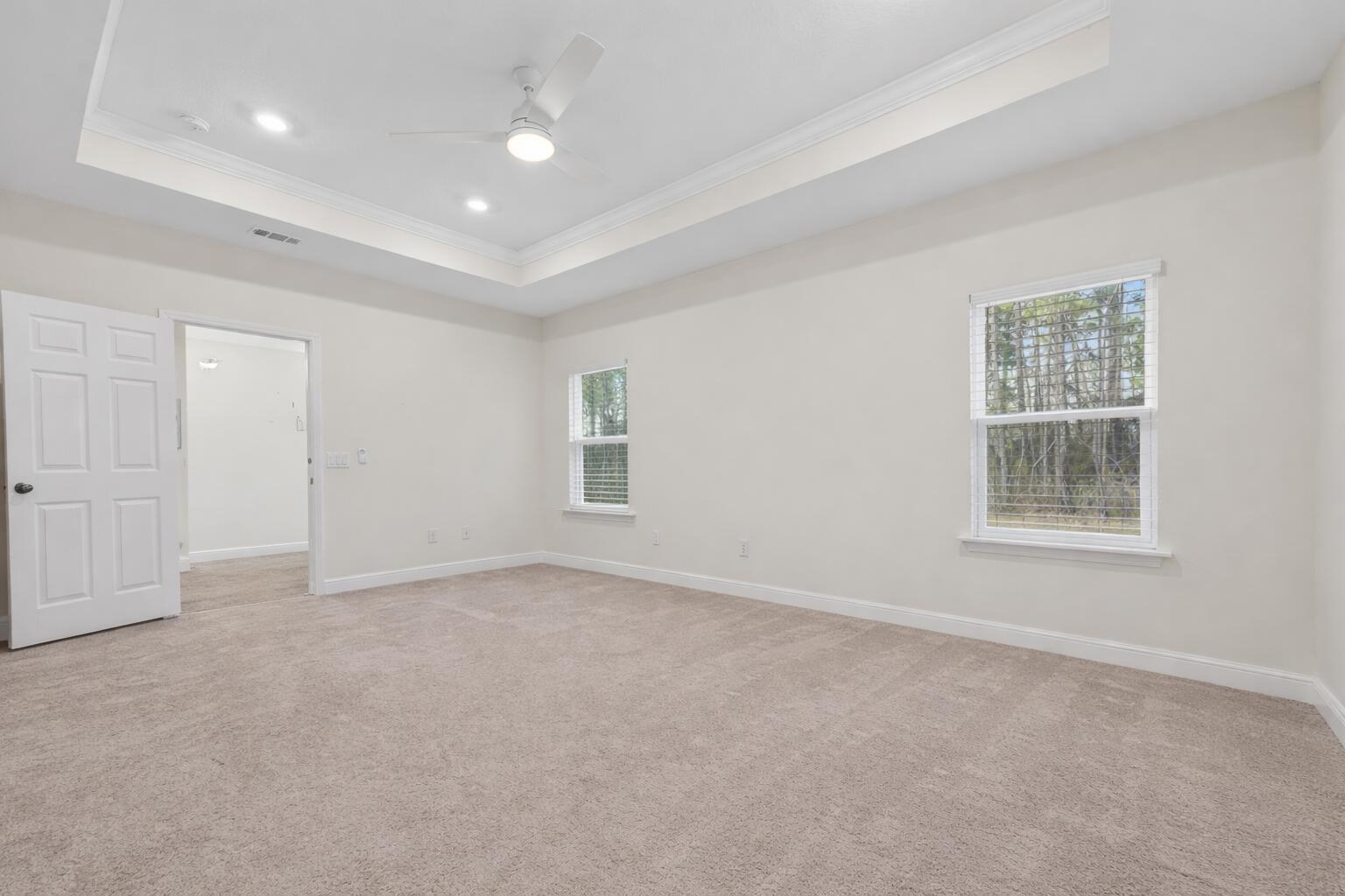7264 Riverview Road Navarre, FL 32566 - Photo 14 of 35 Bright and serene bedroom space