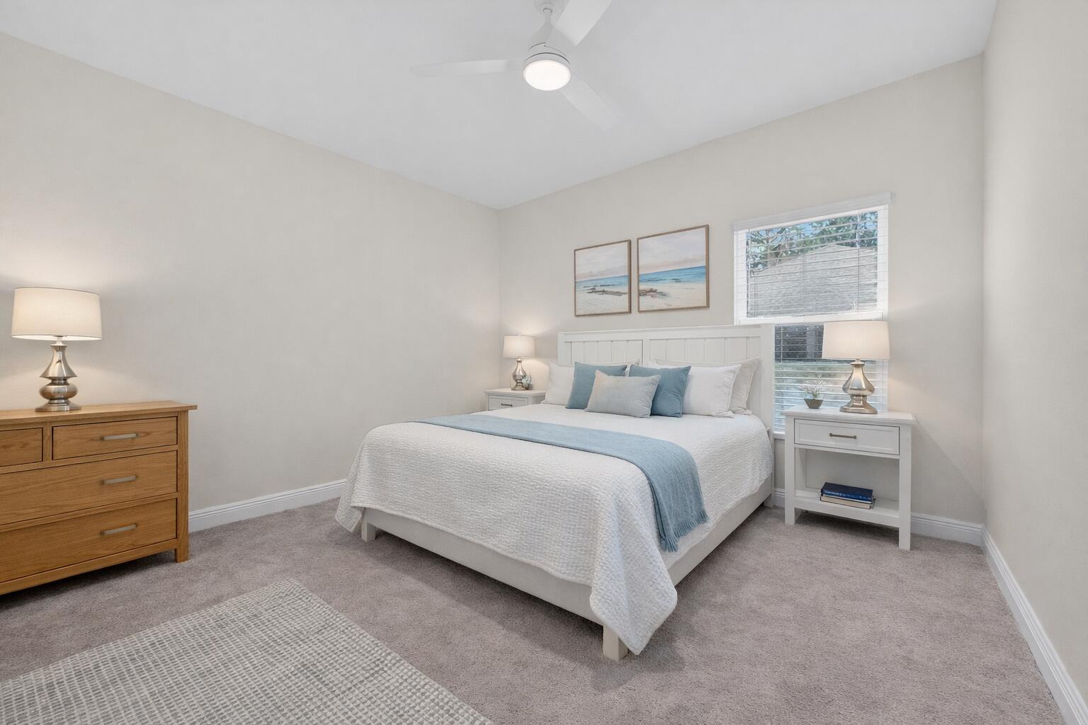 7264 Riverview Road Navarre, FL 32566 - Photo 20 of 35 Serene guest bedroom with beach accents