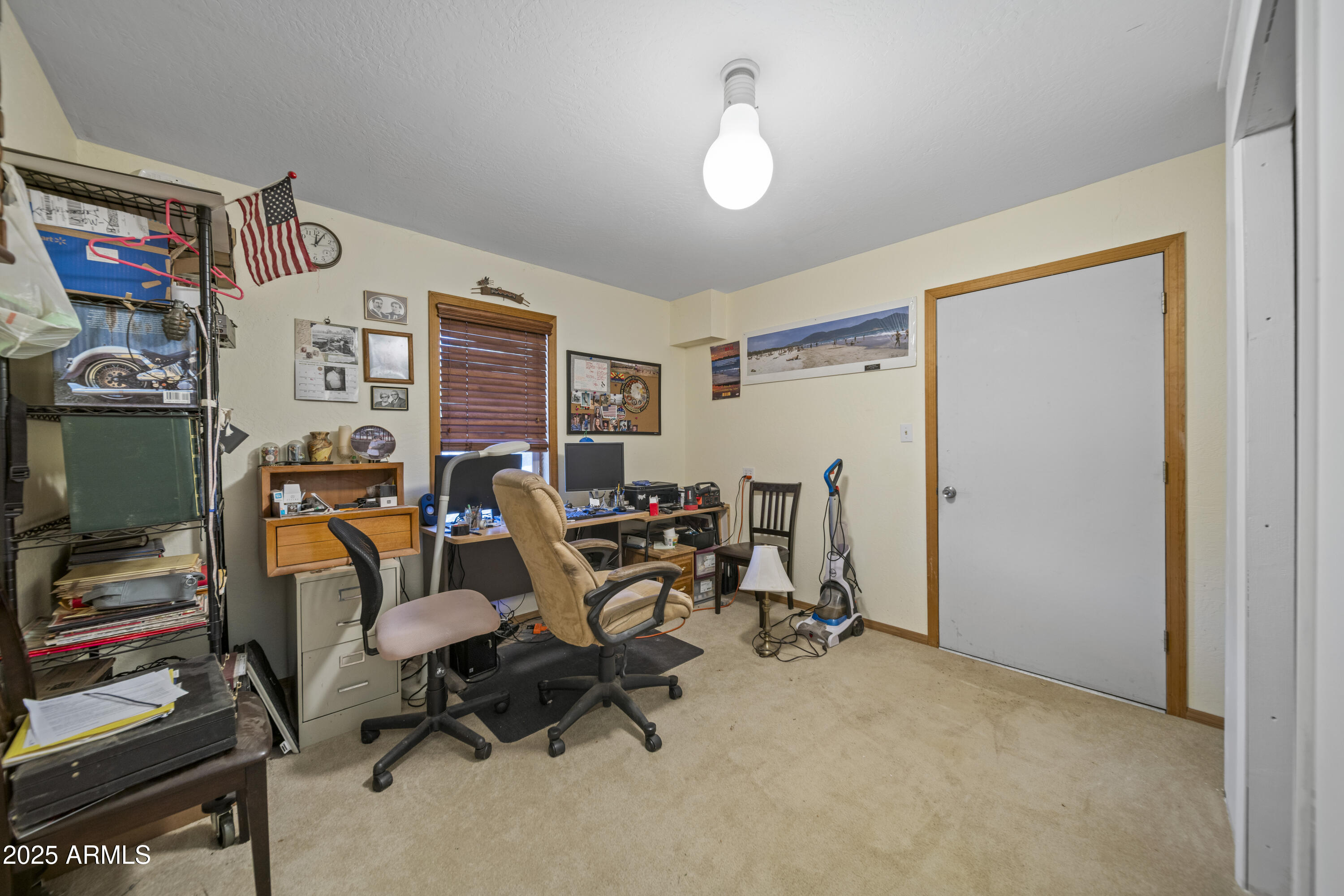 16947 Willow Avenue Yarnell, AZ 85362 - Photo 15 of 44 a view of a workspace with furniture and a window