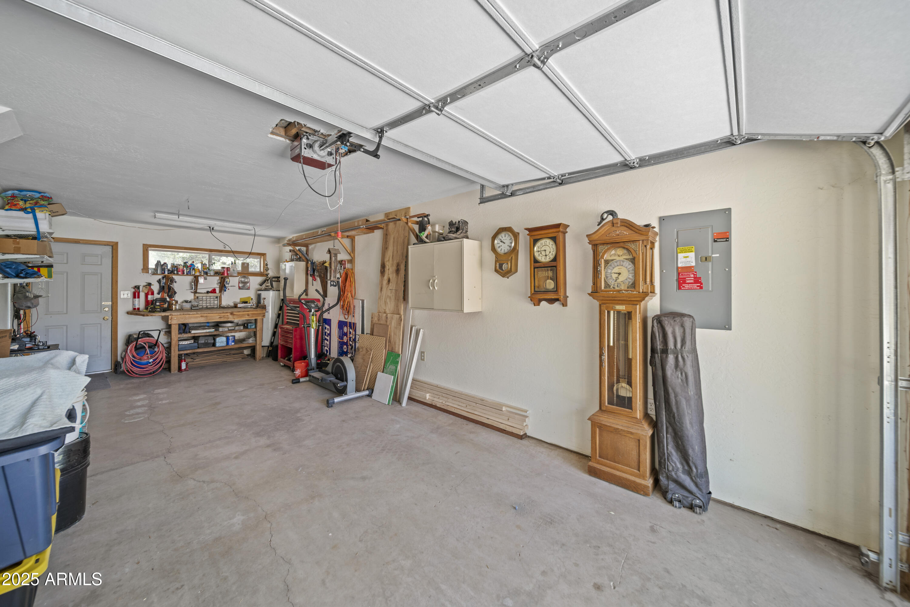 16947 Willow Avenue Yarnell, AZ 85362 - Photo 17 of 44 a view of a garage with storage