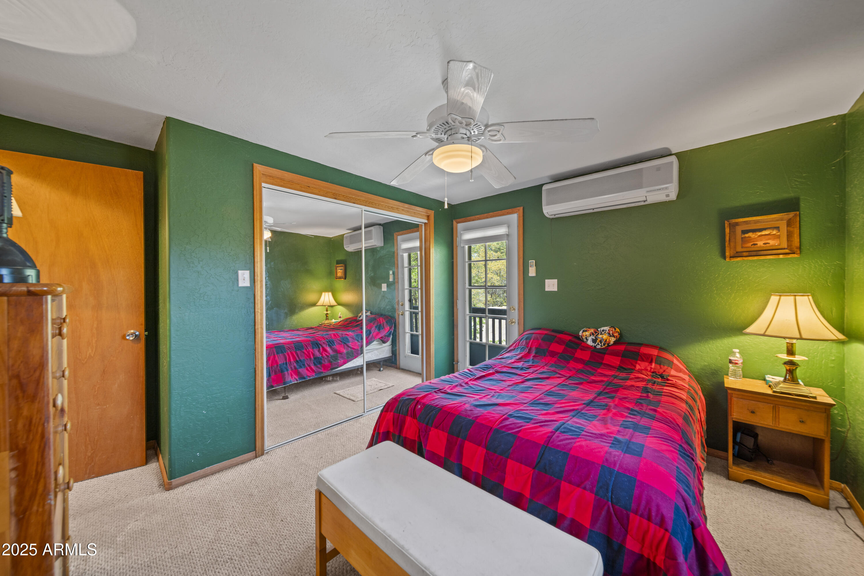 16947 Willow Avenue Yarnell, AZ 85362 - Photo 20 of 44 a bedroom with a bed and wooden floor