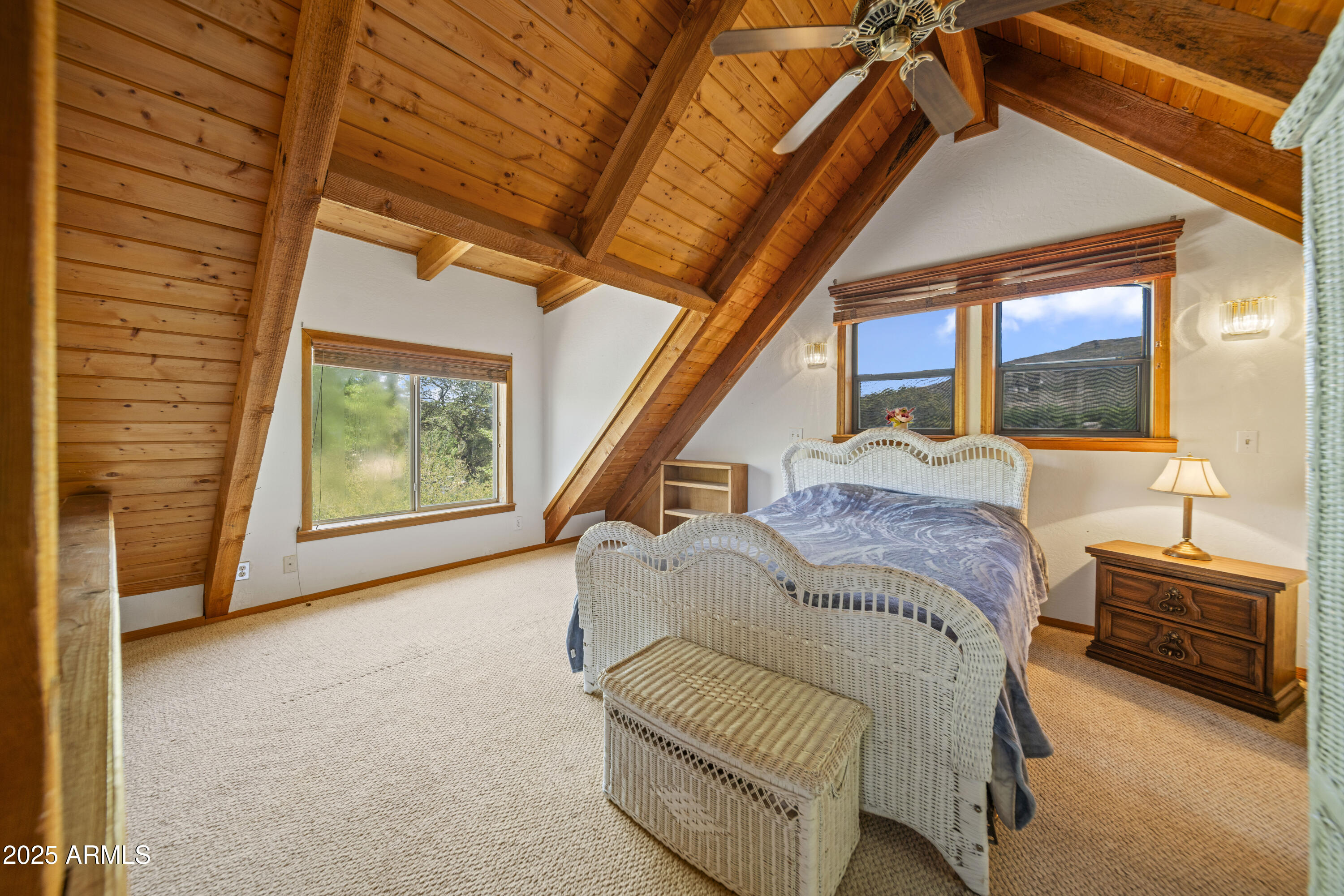 16947 Willow Avenue Yarnell, AZ 85362 - Photo 25 of 44 a living room with furniture and a floor to ceiling window