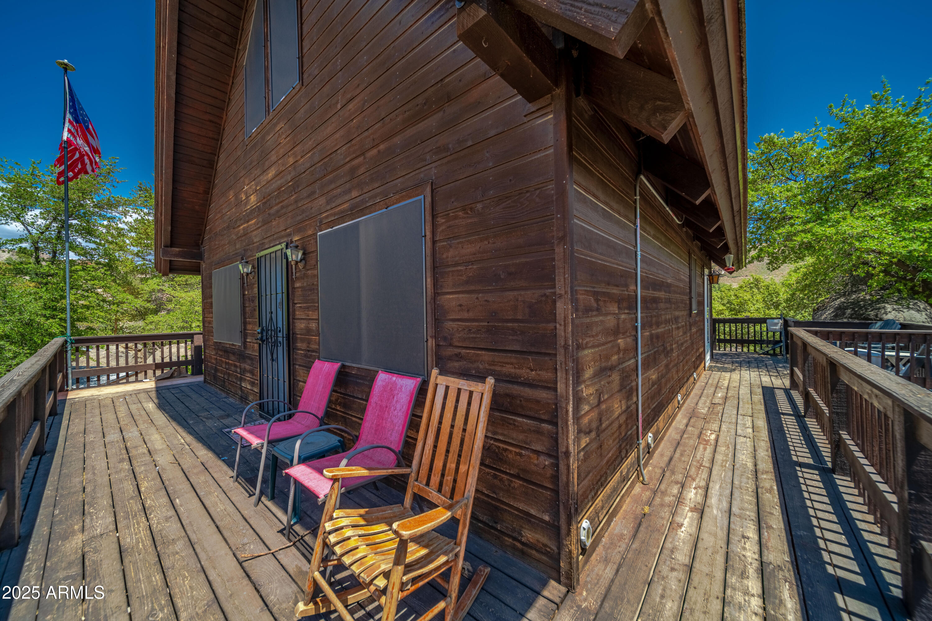 16947 Willow Avenue Yarnell, AZ 85362 - Photo 36 of 44 a balcony with furniture and wooden floor