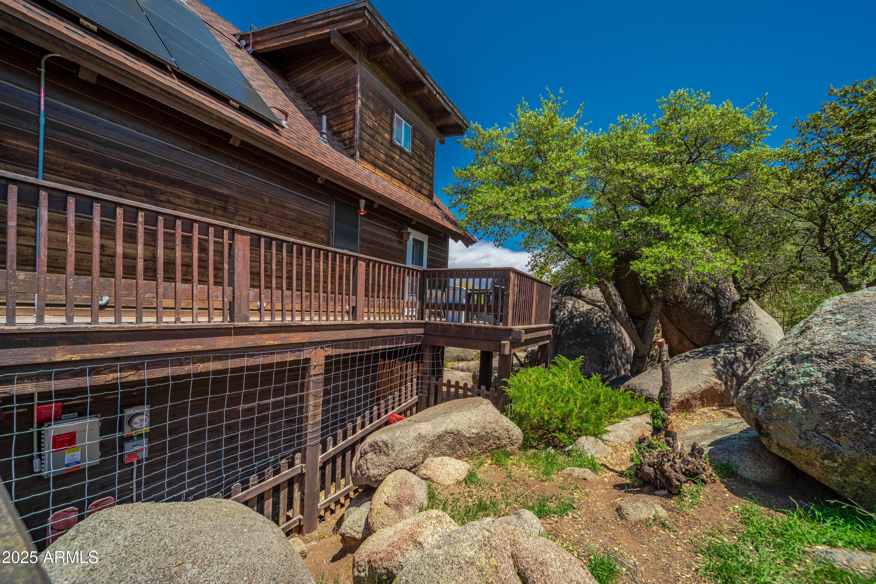 16947 Willow Avenue Yarnell, AZ 85362 - Photo 38 of 44 a balcony with table and chairs and potted plants