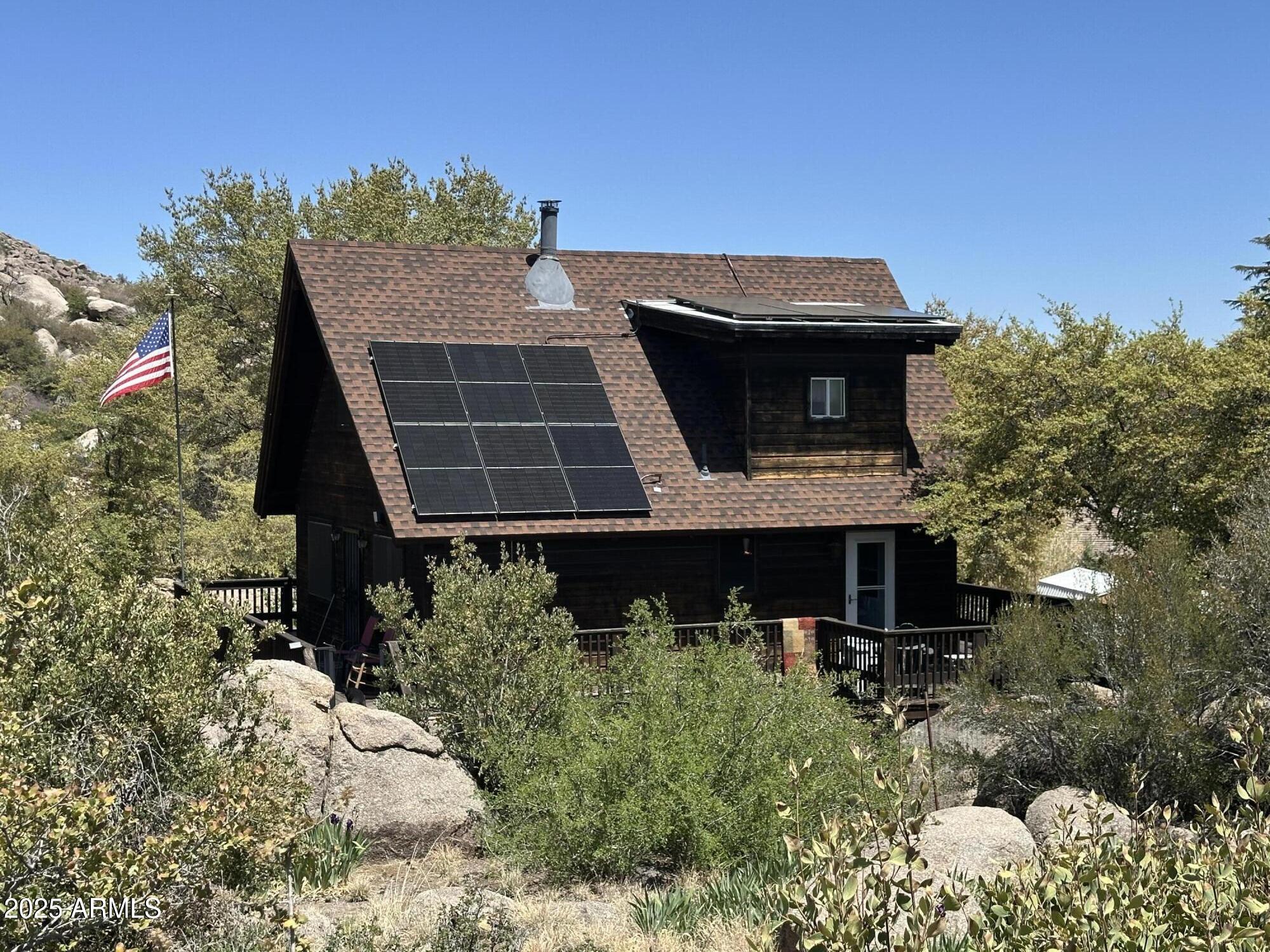 16947 Willow Avenue Yarnell, AZ 85362 - Photo 8 of 44 a front view of a house with a yard