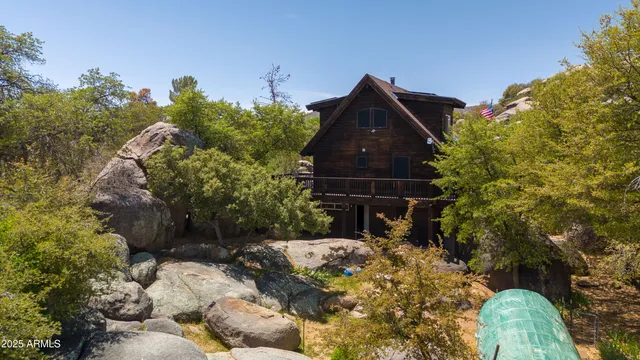 a backyard of a house with lots of green space
