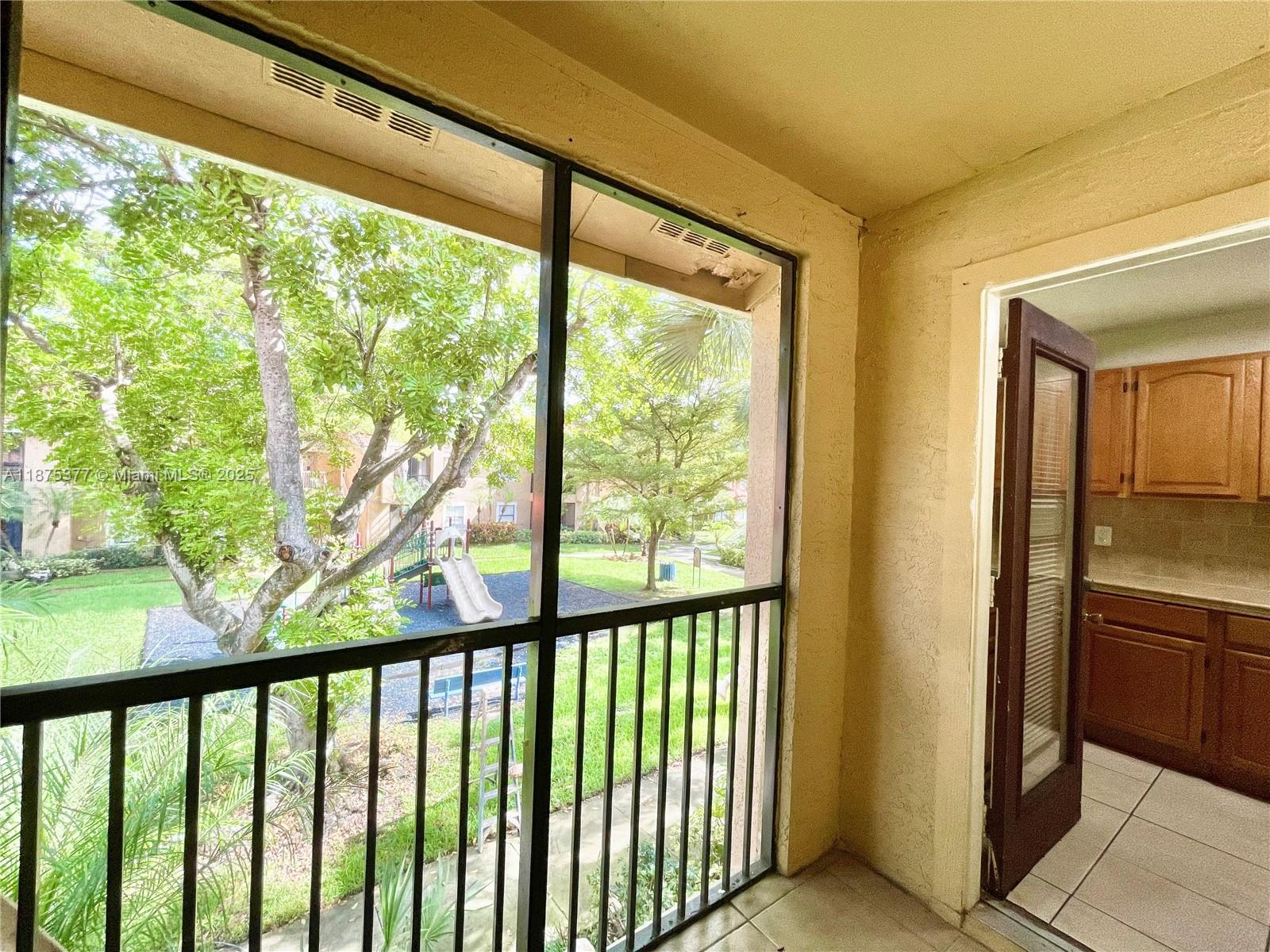 15591 Southwest 105th Terrace, Unit 527 Miami, FL 33196 - Photo 12 of 24 a view of a city from a window