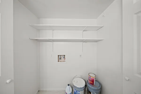 a bathroom with a toilet and a sink