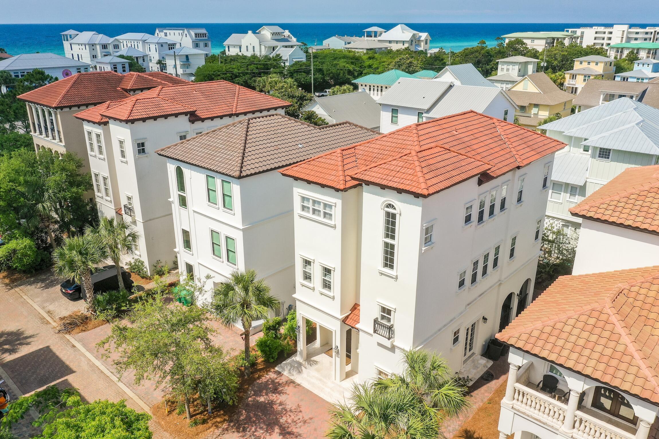 130 Palmeira Way Santa Rosa Beach, FL 32459 - Photo 1 of 38 a aerial view of a house with a yard and potted plants