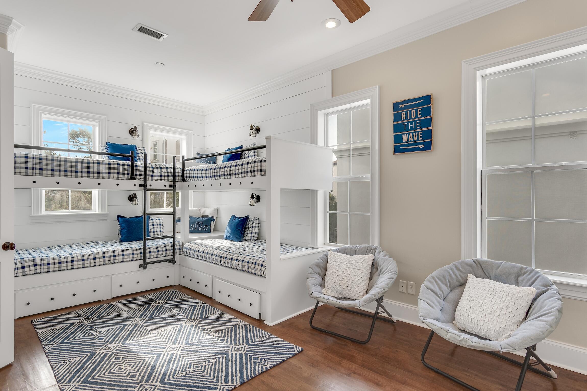 130 Palmeira Way Santa Rosa Beach, FL 32459 - Photo 22 of 38 a living room with furniture and a large window