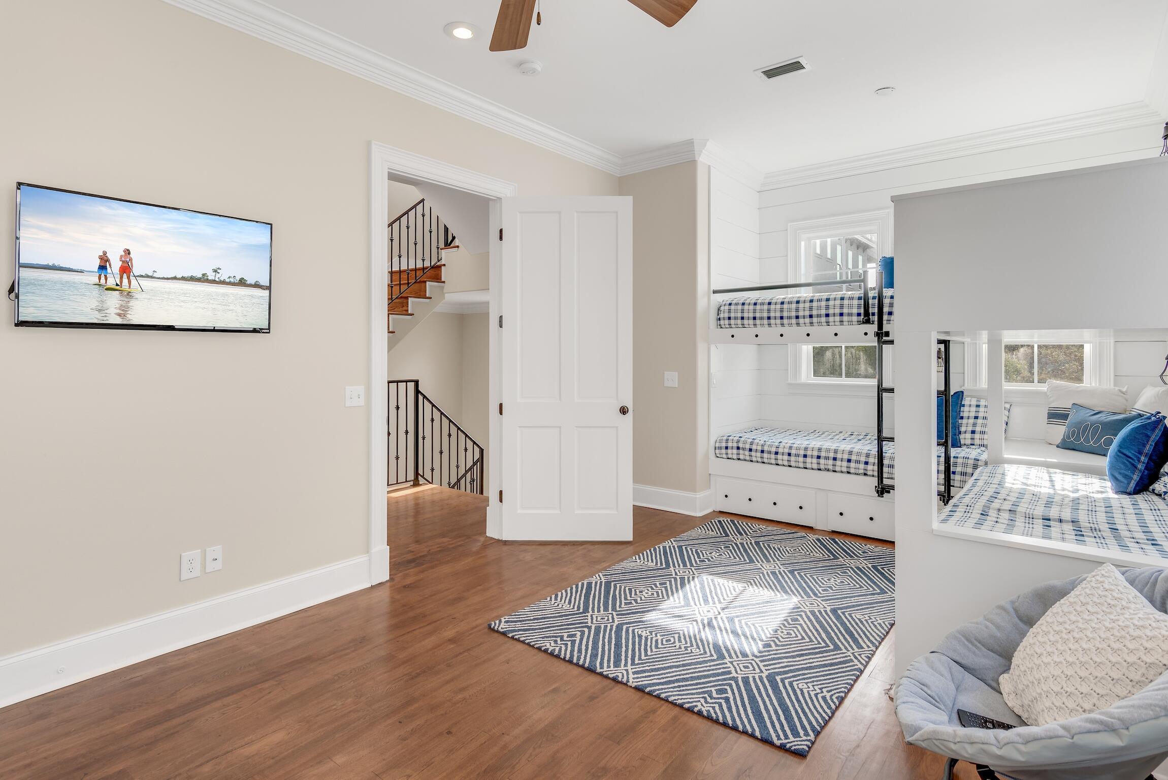 130 Palmeira Way Santa Rosa Beach, FL 32459 - Photo 23 of 38 a living room with furniture and a rug