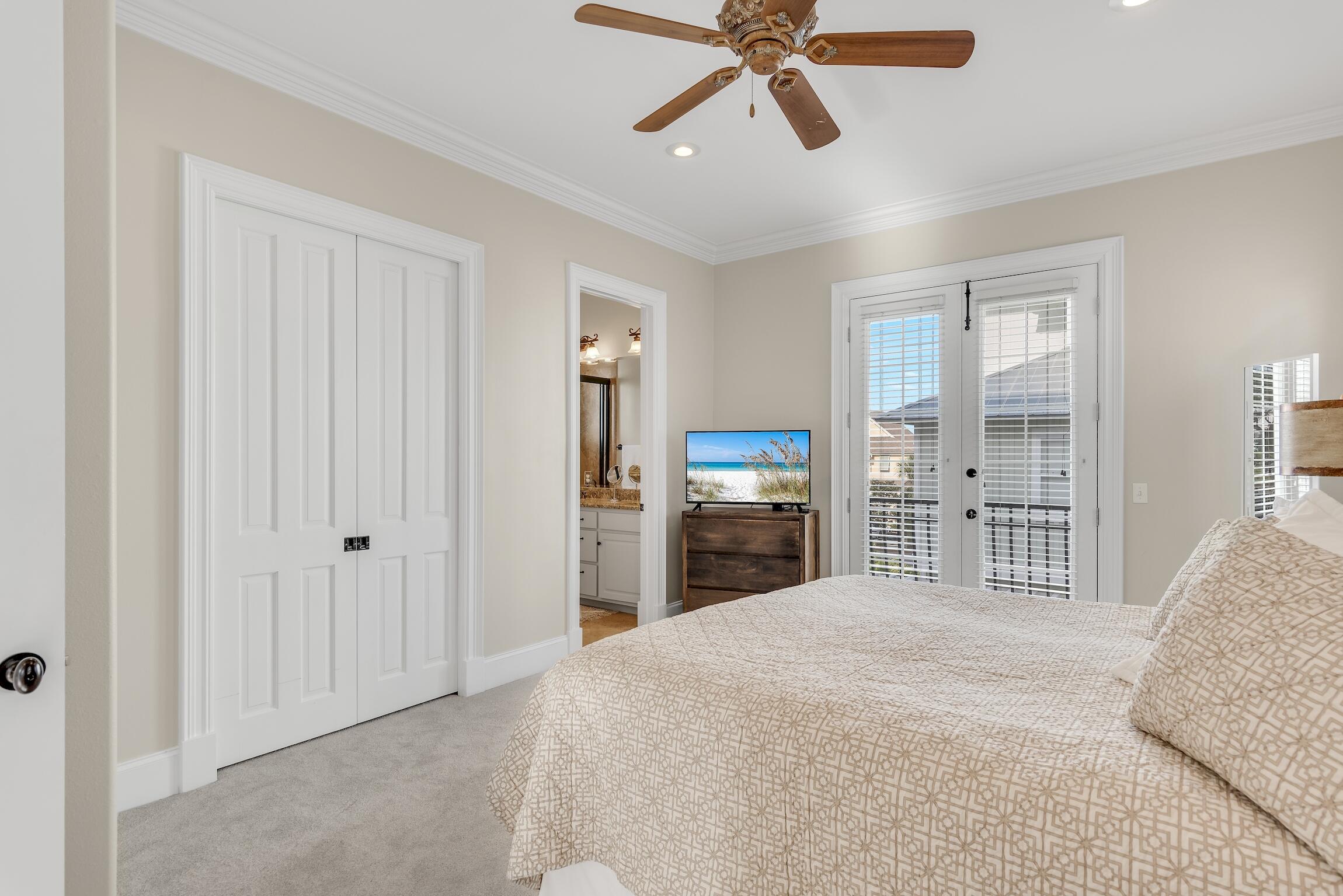 130 Palmeira Way Santa Rosa Beach, FL 32459 - Photo 27 of 38 a bedroom with a bed and a view of kitchen