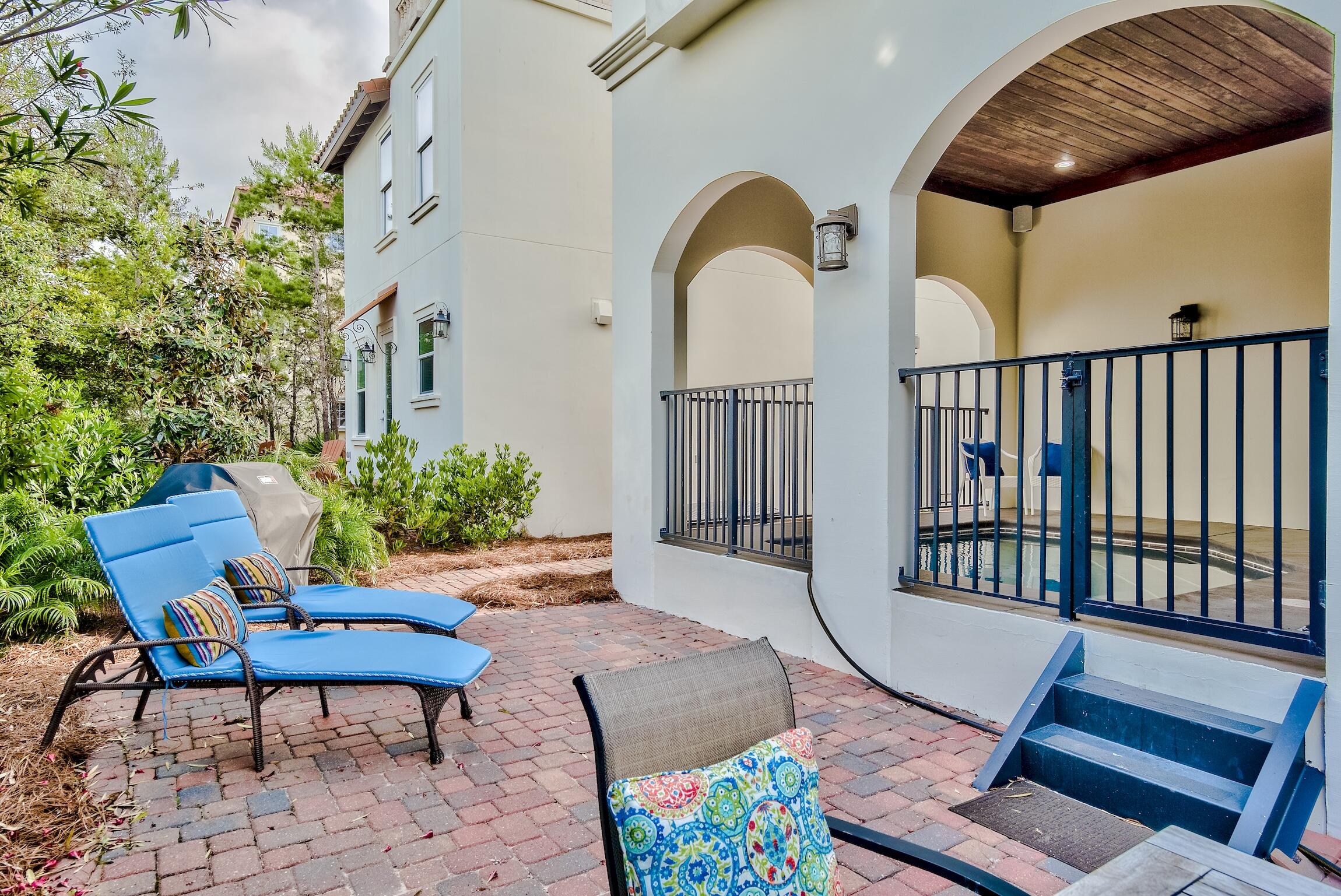 130 Palmeira Way Santa Rosa Beach, FL 32459 - Photo 33 of 38 a view of a porch with furniture