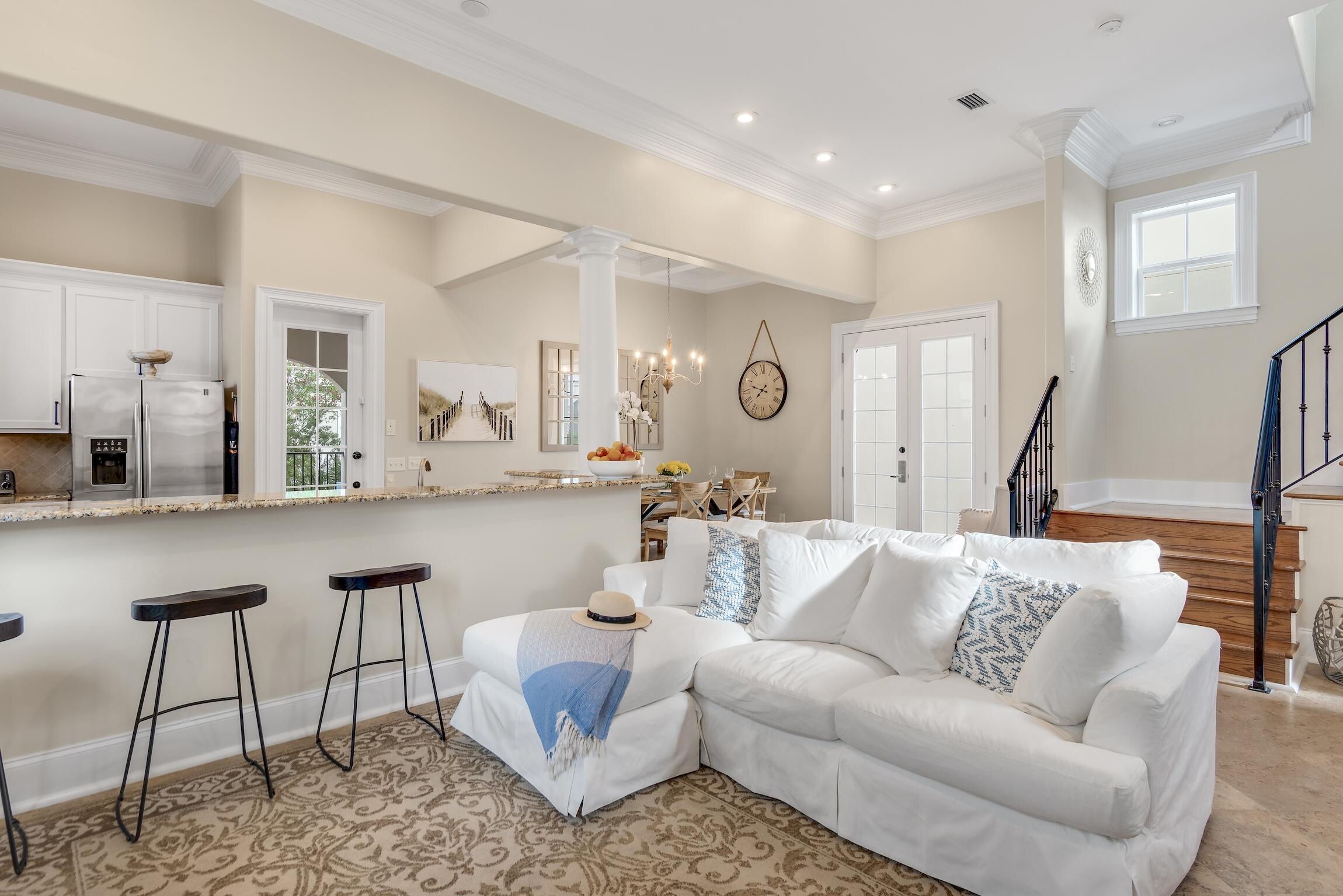 130 Palmeira Way Santa Rosa Beach, FL 32459 - Photo 5 of 38 a living room with furniture and a large mirror