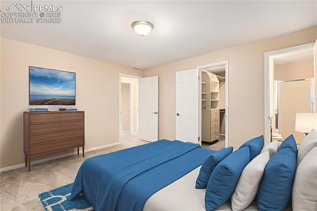 4514 Ridgeglen Road Colorado Springs, CO 80918 - Photo 13 of 29 Virtually Staged. Bedroom featuring light colored carpet and a spacious closet